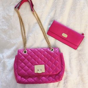 Pink Michael Kors purse and wallet
